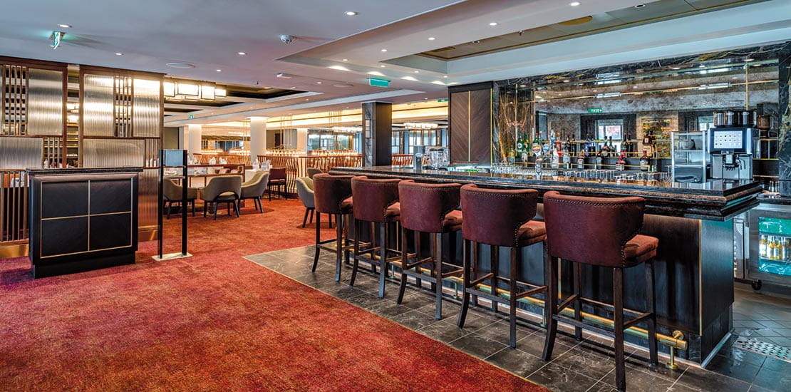 The bar area in the La Vie en Rose at The Club on Spirit of Discovery